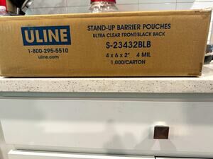 ULINE Stand-Up Resealable Barrier Pouches Clear/Black 4x6x2 4 mil S-23432BLB